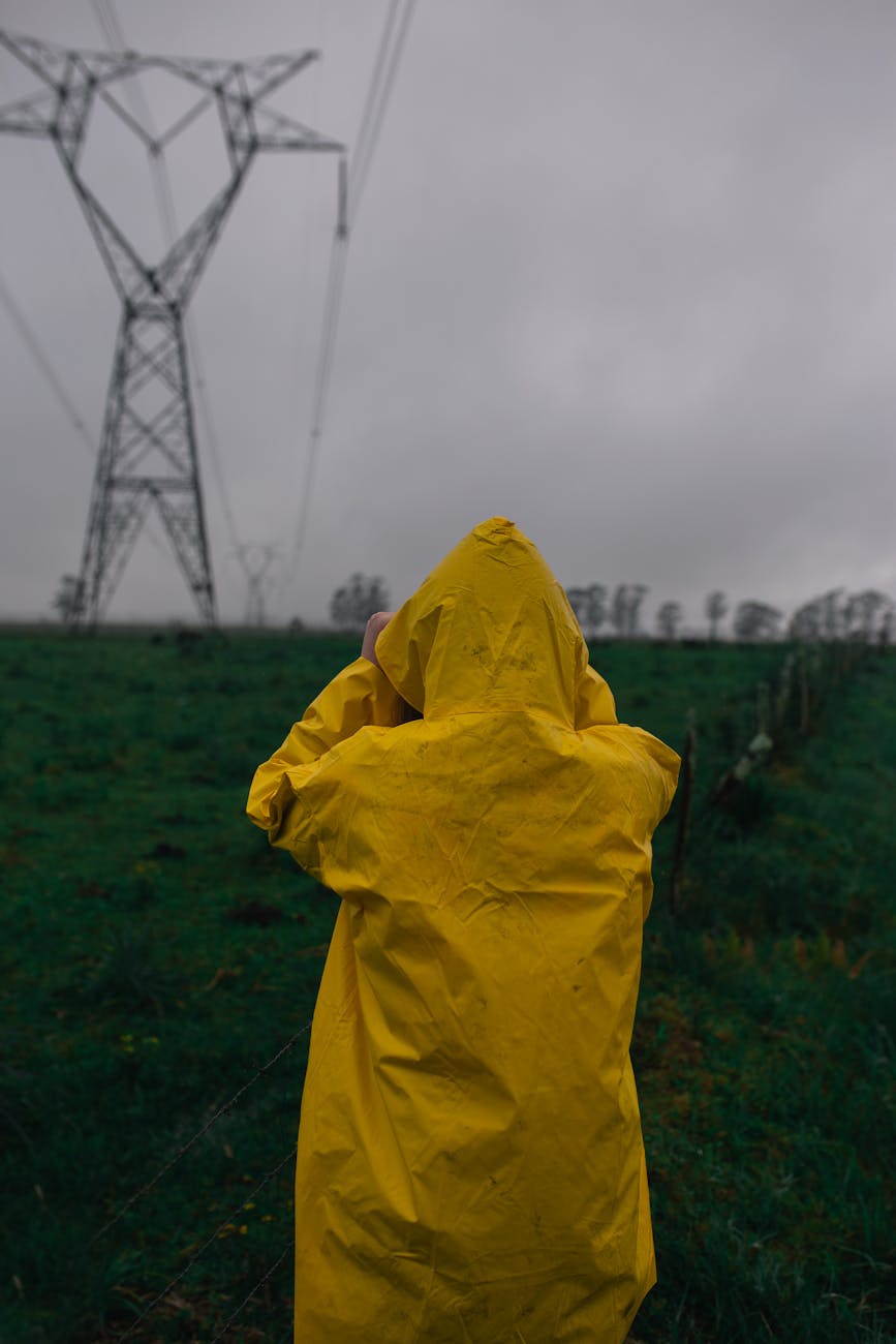 person wearing yellow raincoat