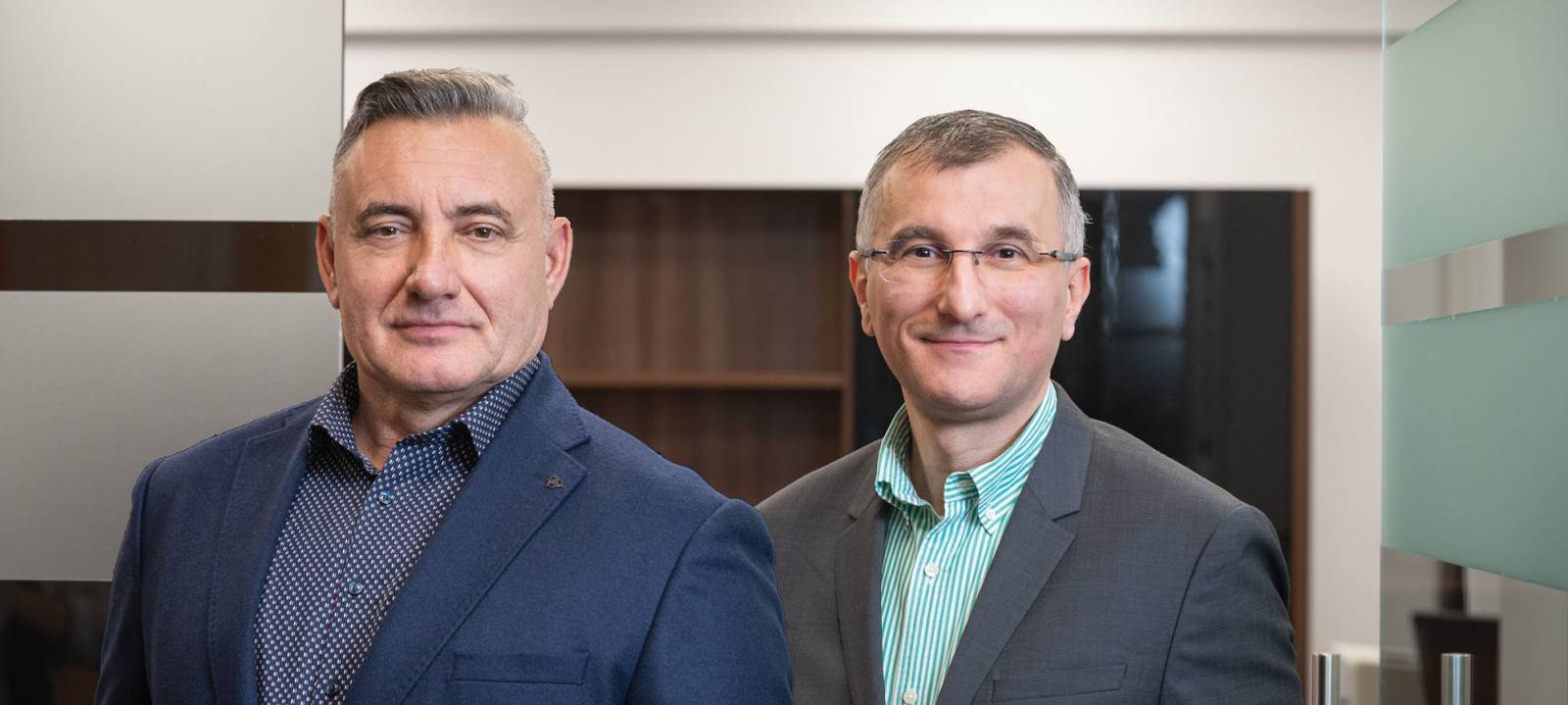 Dr. Gheorghe Loloiu, directorul general al RLG România, și Adrian Vlase, directorul operațional al RLG România